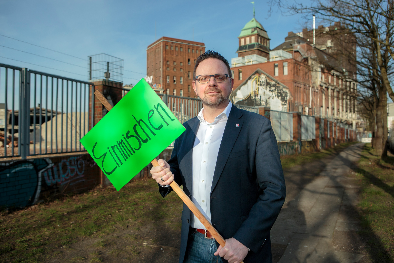 Guido Zeitler Vorsitzender der Gewerkschaft Nahrung- Genuss-Gaststätten (NGG), mit Schriftzug 'Einmischen